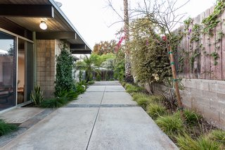 The home's elegant post-and-beam construction as seen from the exterior.