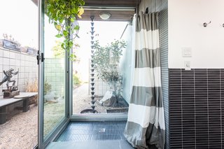 The indoor-outdoor shower.