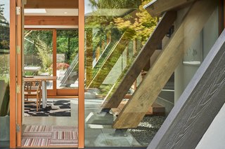 A view from the outside highlights the home's timber frame. 