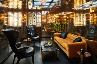 Located in the lobby mezzanine, Bar Alta exhibits a modern take on Art Deco design. The furniture for the space is all custom made from brass and steel with walnut, mohair, velvet, and leather upholstery. 