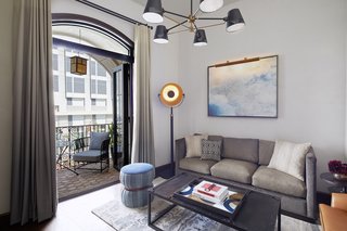 The bright Figueroa suite features a furnished balcony. 