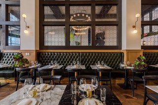 Just off the spacious lobby lies the restaurant Breva, which features white-oak floors and green leather banquettes. An ode to Basque Country, the restaurant is helmed by four-time James Beard Award-nominated chef Casey Lane. French doors extend seating onto the sidewalk, activating the front of the historic hotel for the first time since its inception. 