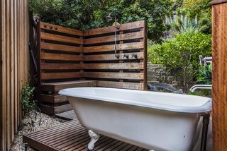 A private outdoor shower and bath create a perfect little nook to enjoy the surrounding nature.