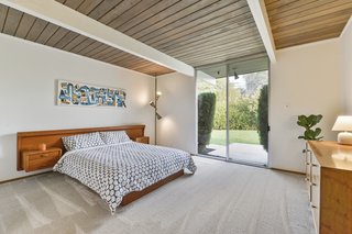 The home has four bedrooms plus a separate utility room that can be used as a fifth bedroom or office.