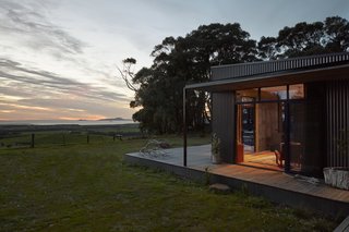 The orientation of the home captures the sunrise and moonrise over the water. 