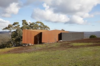 Cor-Ten steel was selected both for its aesthetic appeal and its ability to integrate into the landscape, evolving over time and with the seasons. It also met the client's request for a building that didn't require ongoing external maintenance. 