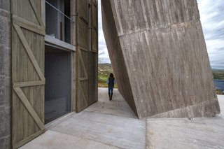 A person shows the grand scale of the structure. 