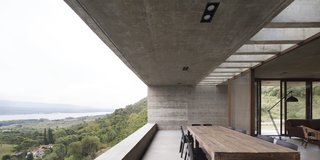 The grand indoor/outdoor terrace—with its killer view—is the focal point of the upper level. 