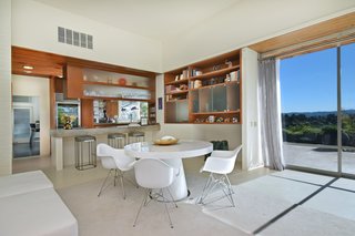 There is even a casual dining area with direct outside access to the pool area. 