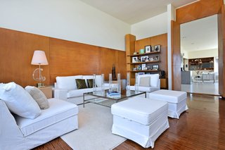 An additional sitting area is wrapped in warm wood. 