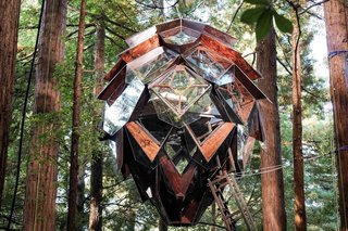 Suspended in the forest, the Pinecone tree house is a sight to behold. 
