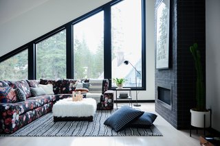 The reverse floor plan and extensive glazing provide natural light where it is needed most.