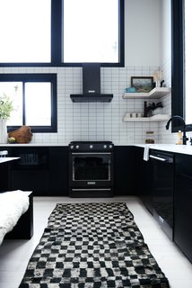 The kitchen rug is from Kat + Maouche. 