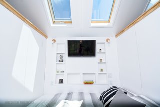 The full-size bed has an IKEA mattress.