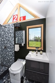The bathroom also includes an incinerating toilet. 