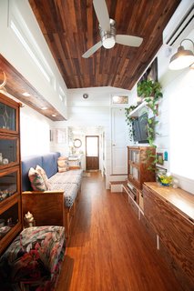 "I loved the challenge of planning a fully functional home on a 32 ft x 8.5 ft trailer. I knew I wanted to include all of the basic living spaces that you would find in a conventional home: kitchen, living room, bathroom, two enclosed bedrooms, a laundry area, and storage spaces," explains Kell.&nbsp;