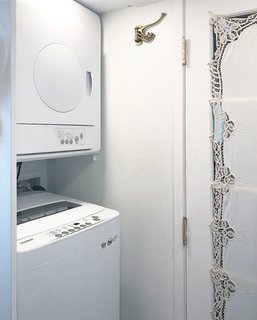 She was even able to squeeze in a compact stacked washer and a vented dryer.