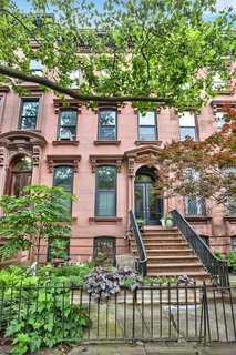 The classic four-story townhouse is located on a block in the recently expanded Park Slope Historic District.