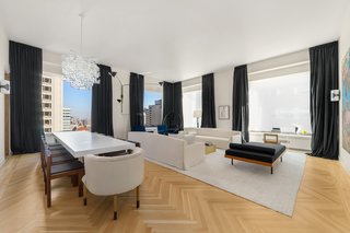 The corner living/dining room offers both north and east exposures with Central Park and city views.