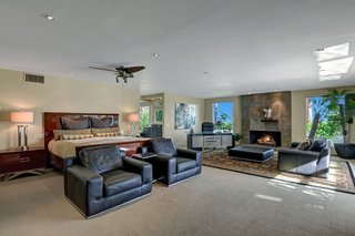 The main house has five bedrooms with ensuite baths—including this enormous 1,400-square-foot master suite with a spa bathroom. 