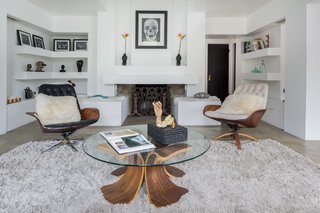 The updated living room is in keeping with the architect's original vision. 