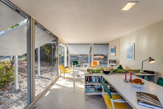 The petite, open-plan guesthouse is divided by public and private space.