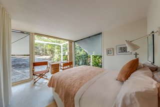 The shutters open and close, providing both privacy and shade. 