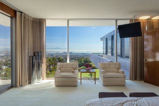 The master suite also boasts breathtaking views and sliding doors which lead out to a small terrace. 