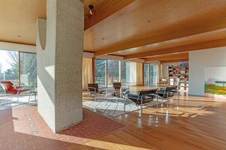 The living and dining areas are located in one large, open-plan space—which is typical of Breuer homes.