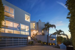 The villa's chunky rectangular forms set against a Los Angeles sunset. 