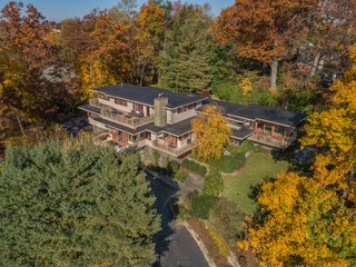 The Usonian-style house sits on a hill with views of the natural surroundings suffusing every room.