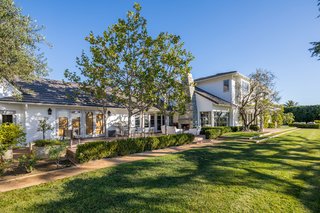 The traditional estate is incredibly private, yet conveniently located just above lower Coldwater Canyon in Beverly Hills.