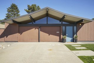 The home, which has a two-car garage, makes use of clerestory windows to keep the interiors sunny.