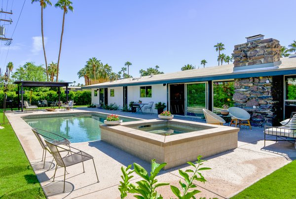 A new spa and a fully remodeled pool entertain guests outdoors.