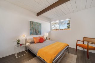 This bedroom with a window neatly tucked into the corner is more typical of Eichler models.&nbsp;