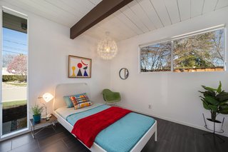 The second bedroom is bright, with more windows that your average Eichler bedroom.&nbsp;