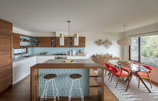 A view into the airy, light-filled kitchen of 51 Nebraska by Todd Davis Architecture. The updated midcentury home pays homage to its roots.