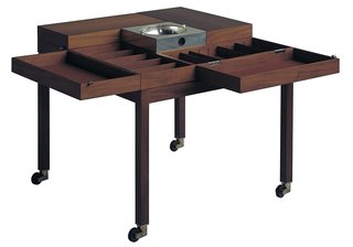 A storage table for pipes and tobacco designed by the duo for King Frederik IX of Denmark.