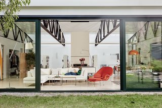 50 Modern Homes With Floor-to-Ceiling Windows - Photo 22 of 50 - This mid-century modern house was transformed from a municipal garage into a private house in the late 1950’s by renowned modernist architect Paul Rudolph. At project start the house was in pristine condition, virtually untouched since it won a Record Houses award in 1960. Ruhl Walker Architects in Boston were tasked with bringing the house up to current energy efficiency standards and with reorganizing the house to accommodate the new owners’ more contemporary needs, while also respecting the noteworthy original design.