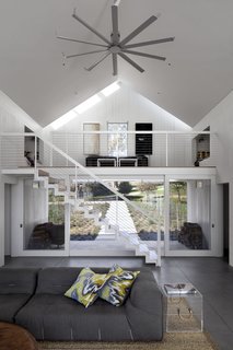 An open mezzanine allows for hot air to rise, and a ceiling fan helps circulate out the hot air.