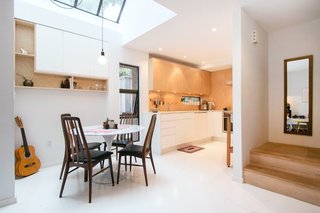 A Revitalized Townhouse that Owes Everything to Angles - Photo 2 of 8 -