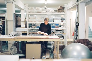 The ANDlight studio occupies the ground floor of an expansive industrial space in Vancouver BC. Peet, Heintzman and Davis partitioned the space with fir-framed corrugated plexiglass walls to form a welcoming office space in the front and an industrious workshop in the back.<br>