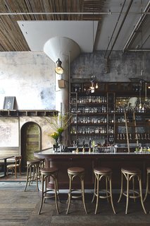 A collaboration between the design studio, NOTHING SOMETHING, and Martin Heid Design + Build, the brewery's concept was built on the history of the space, which was "originally a factory owned by the American Can Company, the corporation that manufactured the world's first beer can."