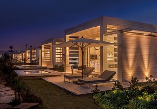 The hotel's private terraces are the perfect spot to enjoy a warm night in on the coast.