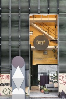 The building’s metal exterior and scrawled graffiti stand in contrast to the brand’s classic Scandinavian designs.