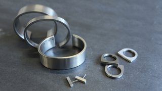 Current product offerings include the thin, standard, and wide cuffs; mini bar earrings; and lightweight short slab ring. 