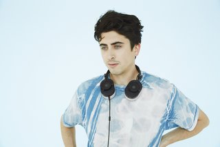 Sulkow wears the MH40 Over Ear Headphones in black and gray.