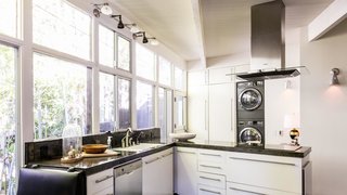 Modern appliances find a home in an airy kitchen.