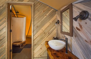 The Autonomous Tent runs on Treebones Resort's water supply. Solar panels power the LED lights, pumps, water filters, and a composting system.