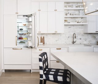 When closed, the integrated fridge becomes flush with the cabinetry. DCS's ActiveSmart Foodcare technology monitors fridge use and adapts the temperature to keep food fresh.